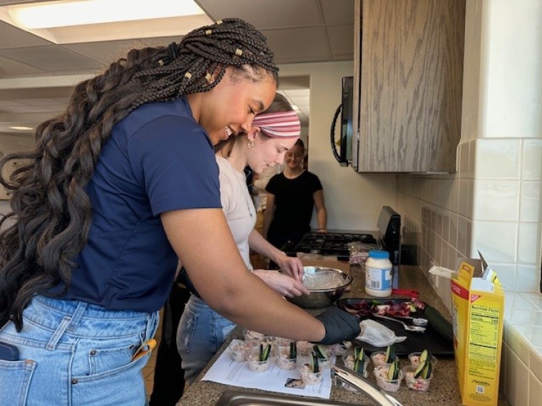 Monique and Madison creating a health snack