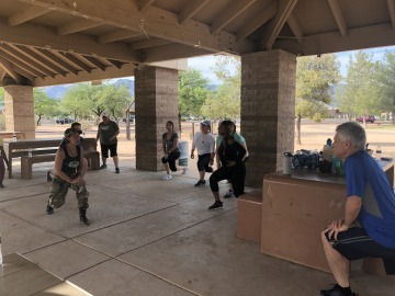 photo of people working out outside