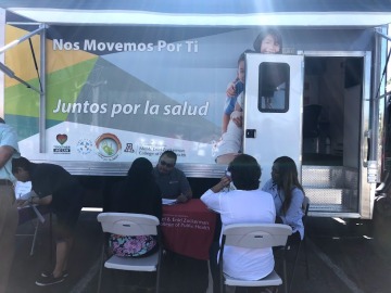People outside the mobile health unit