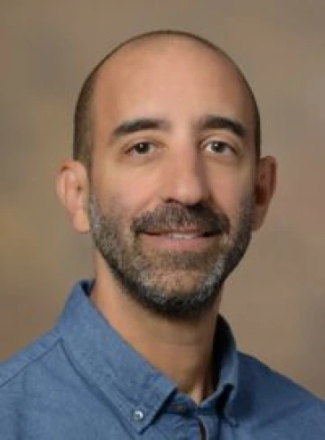 Yann C. Klimentidis
